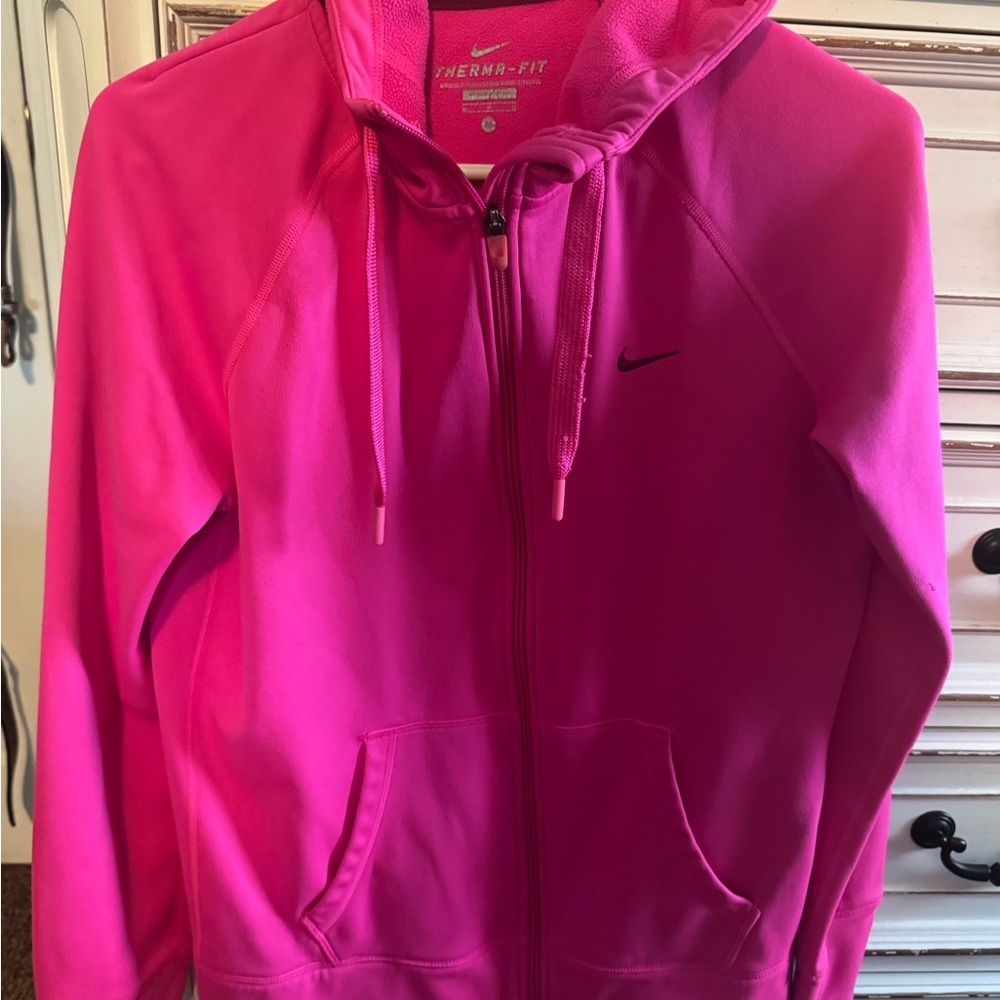 Nike Women's Bright Pink Zip-Up Jacket, has holes to put thumbs through